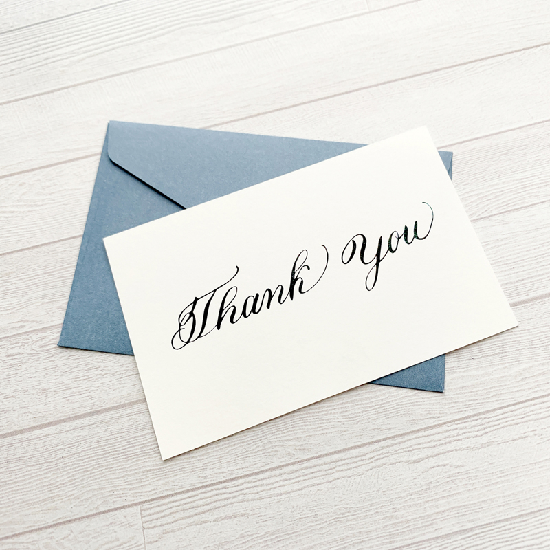 カリグラフィーで書かれたThank youの文字